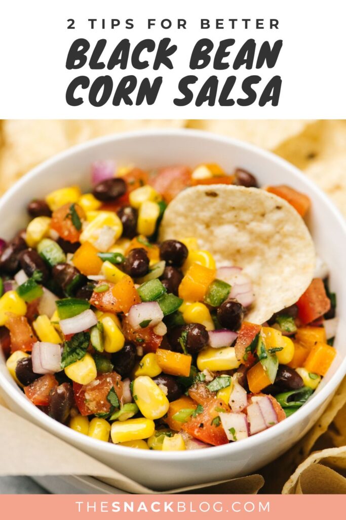Side view, black bean and corn salsa in a white bowl surrounded by tortilla chips; title bar at the top reads 